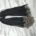 Vista detallada de collares de cordón encerado trenzado negro de 3,0 mm con cierres de langosta - Pack de 100 / Negro