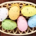 Colorful speckled foam Easter eggs arranged in a small decorative basket - Full Macaron Style (Style 7)