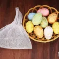 Set of colorful speckled foam Easter eggs in a small yellow basket for holiday decor - Net Bag Style (Style 8)
