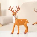 Figurine réaliste de renne brun avec des taches blanches pour votre décor de Noël. - Cerf / Hauteur 25cm