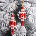 Zweier-Set rote Nussknacker-Soldaten-Weihnachtsbaumschmuck mit festlichen weißen Glitzerdetails - 2er-Set (12*4*2.5cm) / Rot Weiß