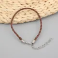 Detailansicht eines braunen geflochtenen Wachskordel-Armbands mit silberner Kette - 3.0MM,17+5CM / Kaffeebraun