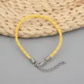 Gelbes geflochtenes Wachsseil-Armband Detail mit silbernem Karabiner und Verlängerungskette - 3.0MM,17+5CM / Gelb