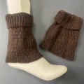 Detailed view of the brown ribbed knit slouch socks highlighting the cozy vertical texture. - Chestnut