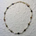 Close-up of elegant handmade necklace featuring natural pearls and tiger eye stone beads - Tiger Eye - Necklace