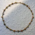 Detailed view of a bohemian stainless steel necklace with natural brown stone beads - Necklace / Picture Jasper