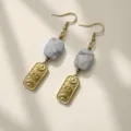 Vintage stainless steel earrings with grey stone beads and celestial eye motifs - White Turquoise