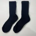Close-up detail of thick ribbed crew socks, soft texture and solid dark color design. - 39-44 / Blue