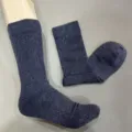 Close-up detail of dark blue merino wool mid-calf socks showcasing ribbed cuff and soft texture. - 41-46 / Blue