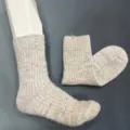 Detailed view of women cozy mid-tube woolen socks with cute colorful speckles and warm fuzzy texture. - Wool Blend