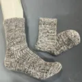 Cozy fuzzy knit wool-blend mid-calf socks detail showing soft texture and cozy warmth for winter. - Greyish White Marl