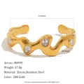 Detailed view of wavy 18K gold plated stainless steel bangle with zircon stones. - Wavy Bracelet (B0995) / Gold White Zirconia