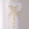 Detail view of a metal dragonfly suncatcher featuring iridescent hanging crystal prisms - Butterfly Style