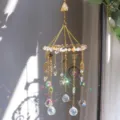 Acchiappasole in cristallo naturale con ciondoli stella e luna, riflessi arcobaleno - Ge10-yellow gum flower / 39cm