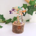 Macro view of handmade crystal tree of life with natural wood stump base for decor - Mixed / 13cm Version
