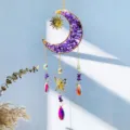 Detailed view of moon suncatcher with amethyst chips and crystal prism reflections. - Amethyst Style / 40CM