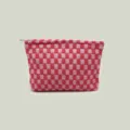 High-quality front view of a pink and red checkered knitted cosmetic pouch with zipper - Red Plaid