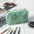 Neceser de pana verde menta con caritas sonrientes negras y pinceles de maquillaje - Verde / 16*7*9cm