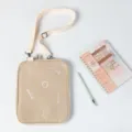 Beige minimalist iPad crossbody bag with adjustable shoulder strap and embroidered letters - Off White / 11"