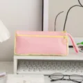 Detailed view of a cute pink and yellow canvas pencil case on a clean white desk setup - Pink and Yellow