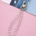 Eleganter transparenter Acrylperlen-Schlüsselanhänger mit robustem goldenem Karabiner - Einzelstück / Goldene Schnallenkette
