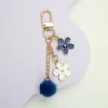 Χαριτωμένο μπρελόκ λουλούδι sakura με μπλε pom-pom για διακόσμηση τσάντας δώρο - Μπλε ζαφείρι