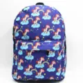 Durable purple school backpack featuring a vibrant 3D unicorn and rainbow print - Multiple Unicorns on Blue Background