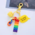 Close-up detail of the rainbow building block keychain with "I'm stuck on you!" text charm. - Single OPP Bag / Letter Sign Brick Style (Yellow Series)