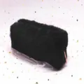Close-up of soft black plush octagonal pencil bag with metallic zipper - Black