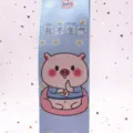 Detailed view of cute cartoon pig pattern on a light blue PU leather student pencil case - I'm Not Angry