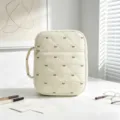Bolsa de viaje acolchada crema grande con elegante bordado de lazo marrón y asa lateral - Beige