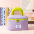 Portable purple and green waterproof cosmetic bag with a comfortable large handle. - Purple