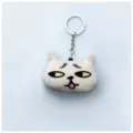 Llavero creativo de peluche con cabeza de gato blanco y divertida expresión en 3D - Blanco Incómodo