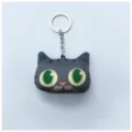 Llavero creativo de peluche con cabeza de gato impresa en 3D, grandes ojos verdes y anillo - Gris Redondo
