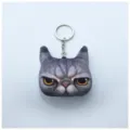 Llavero de peluche creativo con cabeza de gato gris impresa en 3D y expresión gruñona - Gato Feroz