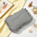 Black and white striped cosmetic bag with ruffled edges in seersucker fabric - Black