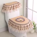 Detail shot of quilted fabric toilet seat cover with lace ruffles and heart decor. - Toilet Cover Set / Heart Coffee
