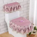 Detailed view of a pink quilted toilet seat cover set with floral lace and cute bow. - Three-Piece Set / Sophie Pink