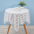 White lace dust cover featuring elegant leaf pattern for bedside table, microwave and appliances. - Diamond White