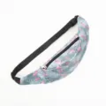Close-up detail of flamingo print sports waist bag with durable black adjustable strap - Vibrant Flamingo