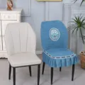 Blue quilted elastic dining chair cover with exquisite floral embroidery and ruffles. - Curved Shell Chair Covers / Good Luck Style Blue