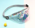 Transparent PVC waist bag for girls featuring a cute unicorn print and holographic trim - Playful Unicorn