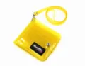 Macro view of a yellow glittery transparent PVC hanging neck wallet with a lanyard - Yellow