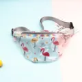 Close-up of clear PVC fanny pack with pink flamingo prints and holographic trim - Heart Flamingo