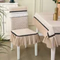 Beige quilted dining chair cover and matching tablecloth set with lace ruffle trim. - Snowflake Coffee