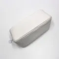 Vue de dessus de cette trousse à crayons minimaliste en similicuir PU beige clair - Blanc