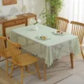 Elegant light green lace tablecloth with intricate floral embroidery on a dining table - 145*50CM / Phoenix Tail Pattern Green