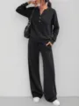 Elegante set loungewear nero in due pezzi con top a maniche lunghe e pantaloni larghi - Taglia S / Top And Bottom / Nero