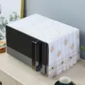 Detailed view of elegant white lace dust cover with floral embroidery on a black microwave - W45*D30*H27cm Lace Height / Midsummer Coffee