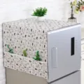 Detailed view of cream fabric refrigerator dust cover featuring cat prints and side pockets - Single Door 55*130cm / Cartoon Cat